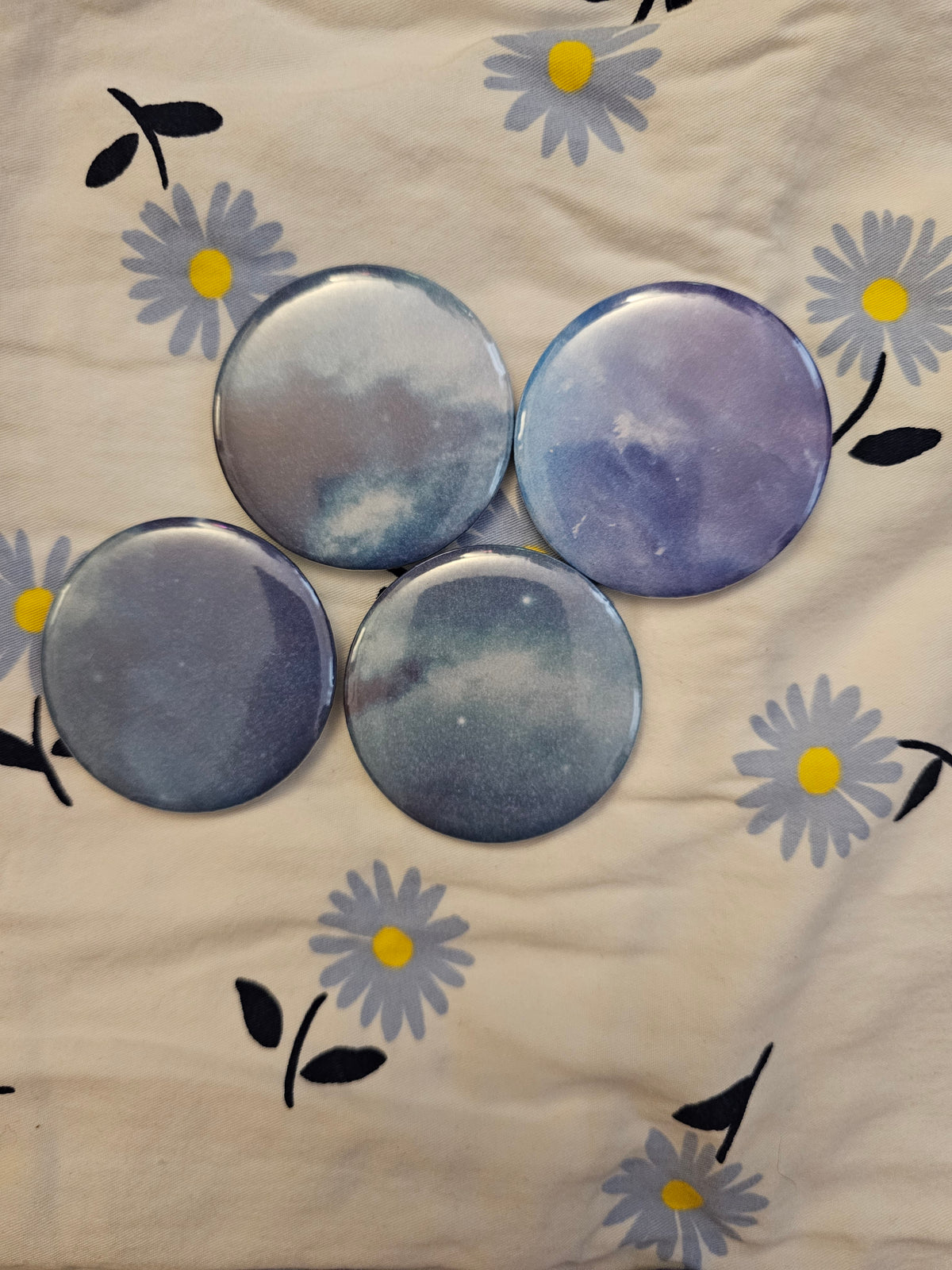 2.25" cloudy skies mystery button pin